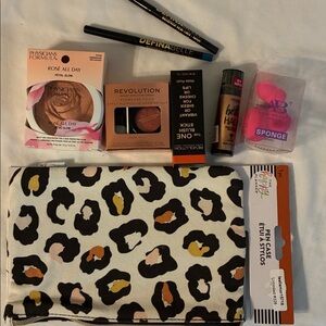 Makeup Revolution Set with Black, Brown, and Gold Accents